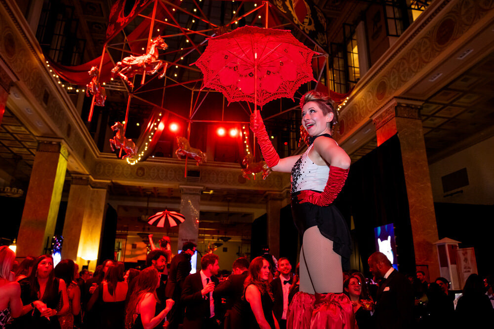 2026 Black and White Party - red umbrella and a crowd