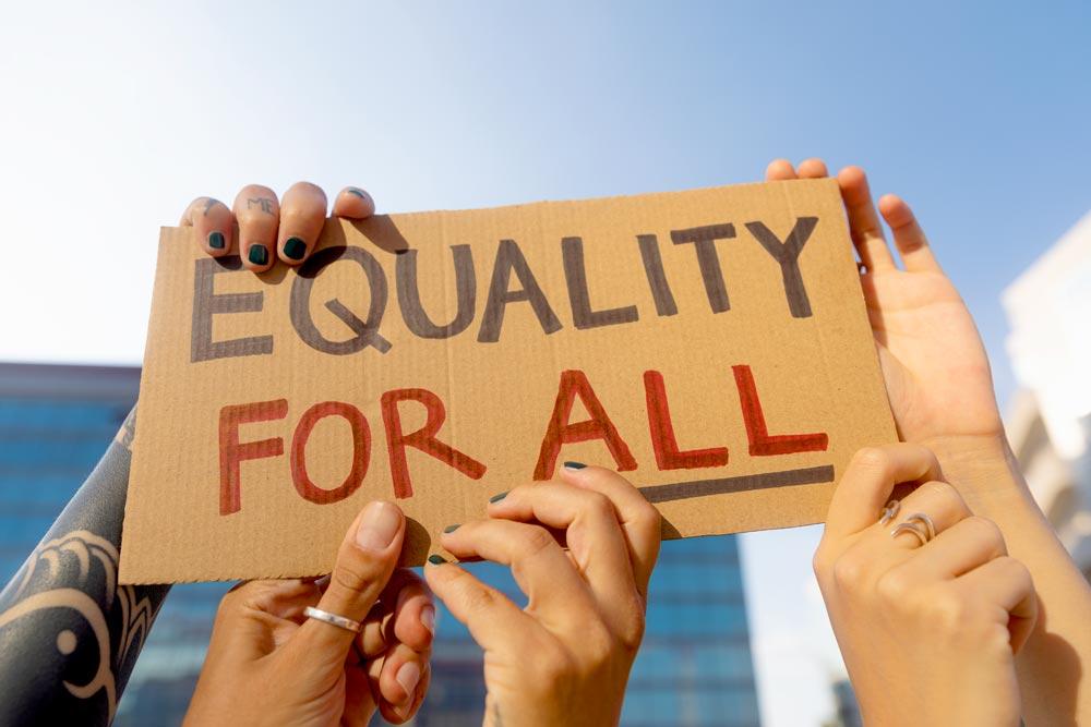 Equality for All sign in people's hands